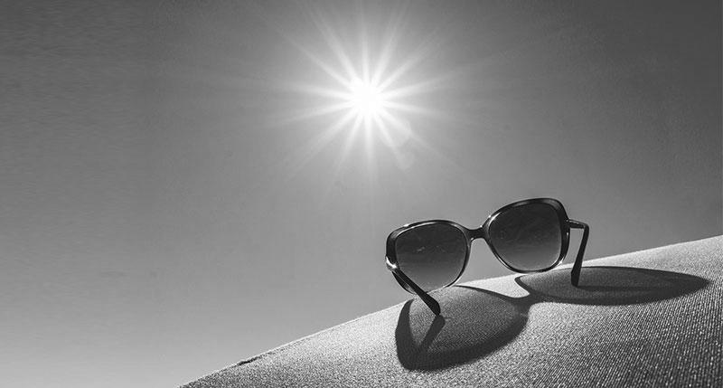 Wearing Sunglasses on Sand photo 3